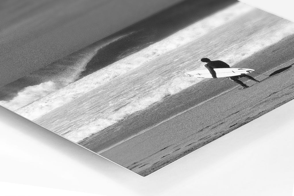 Under Pressure surfing metal prints available of a surfer holding a surfboard on the North Shore of Oahu in Hawaii at Pipeline.